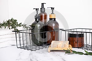 Amber glass cosmetic bottle with eucalyptus leaves