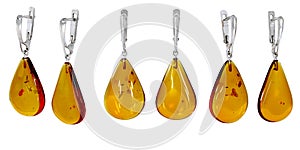 Amber jewelry earrings. Baltic amber. Isolated cut out image.