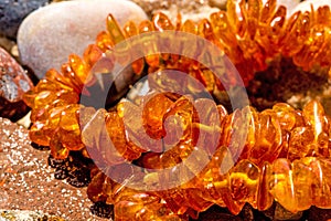 Amber necklace on a beach of the Baltic Sea