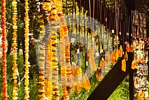 Amber pendants and necklaces at the street market of Curonian Spit, Kaliningrad region