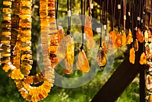 Amber pendants and necklaces at the street market of Curonian Spit, Kaliningrad region