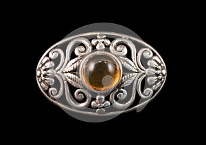Amber and silver brooch