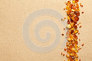 Ambers On Sand Background