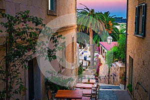 Ambiance street and street cafe at dawn, Hvar, Dalmatia, Croatia