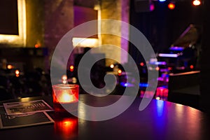 Ambience with a candle in a piano bar in Berlin, Germany photo