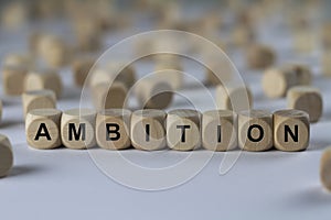 Ambition - cube with letters, sign with wooden cubes