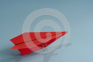 Ambition and goal concept with red paper plane on blue background. 3d rendering