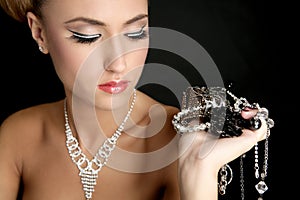 Ambition and greed in fashion woman with jewelry