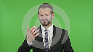 The Ambitious Businessman getting Upset against Chroma Key