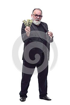 ambitious businessman showing a bundle of dollar bills. isolated on a white background.