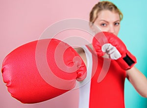 Ambitious girl fight boxing gloves. Female rights. I am gonna kick you off. Confident in her boxing skill. Boxing