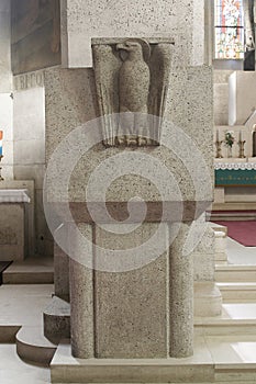 Ambo with the symbol of Saint John in the church of Saint Mark in Zagreb, Croatia photo