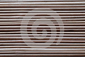 Amboo strands lashed together to make a roll able mat