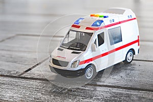 Ambulance background toy medical health care vehicle sirens blue lights photo