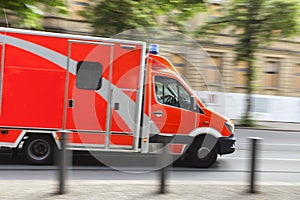 Ambulance car speeding on city streets