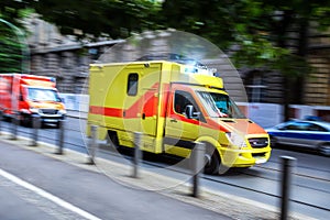 Ambulance car speeding on city streets