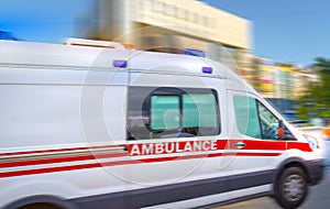 Ambulance in the city on a blurred background