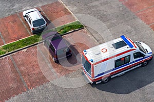 An ambulance flashes to the call