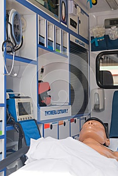 Ambulance perfectly equipped with emergency equipment and dummy for first aid practices