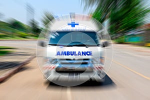Ambulance speeding to accident, Emergency ambulance travels through city street zoom effect.
