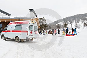 The ambulance staff provided first aid to the injured skier at a