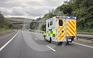 Ambulance on a UK motorway responding to emergency photo