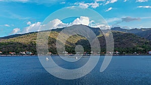 Amed bay coastline. Aerial drone view to calm sea in Amed, Bali, Indonesia