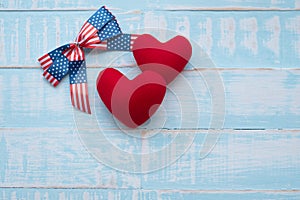 America ribbon on blue wood background