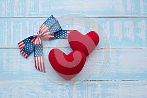 America ribbon on blue wood background