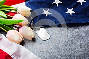 America United States flag and chain dog tags and tulip flower
