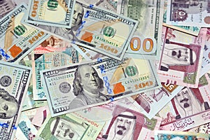 American 100 dollars banknotes and Saudi Arabia riyals currency banknotes, Saudi Arabia money and American dollars currencies