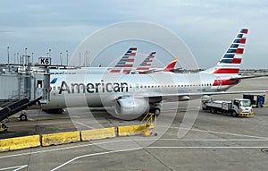 American Airlines planes parked at the gates of Chicago O'Hare International Airport