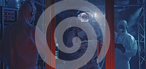 American astronaut testing spacesuit mobility