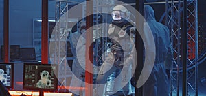 American astronaut testing spacesuit mobility