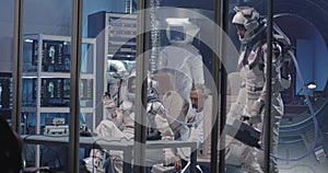 American astronauts waving during press conference