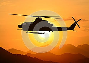 American attack helicopter silhouette in the flight