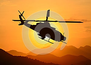 American attack helicopter silhouette in the flight