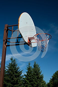 American Basketball Hoop against Blue Sky