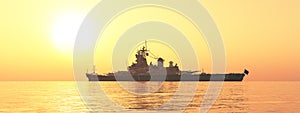American battleship of World War II at sunset