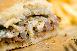 american beef hamburger with cheese and french fries at beautiful fast food and cafe bistro.delicious low price hamburger in