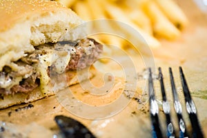 american beef hamburger with cheese and french fries at beautiful fast food and cafe bistro.delicious low price hamburger in