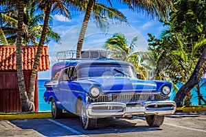 American blue classic car parked on the beach in Varadero Cuba - Serie Cuba Reportage