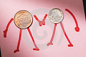 American cent and one Russian penny hold hands. The concept of mutually beneficial relations between countries