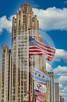 American and Chicago Flags by Chicago Tower