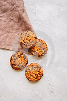 American chocolate chip cookies on a white stone background. Top