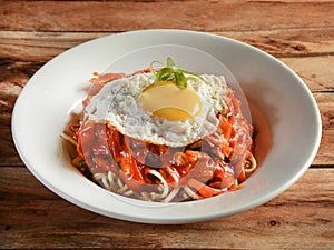 American Choup suey served over a rustic wooden background, selective focus