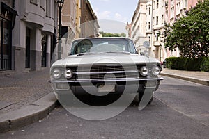 American classic veteran parking on the street