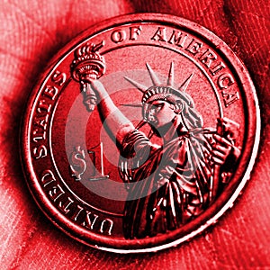 American coin lies in the palm. 1 dollar close-up. Red square tinted illustration in Republican Party GOP color. Bright and catchy