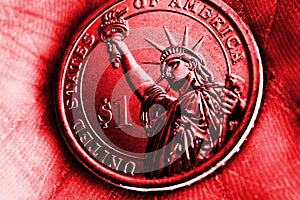 American coin lies in the palm. 1 dollar close-up. Bright red tinted illustration in Republican Party GOP color. Vivid and catchy photo