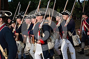 American colonial soldiers marching in historic Williamsburg Va